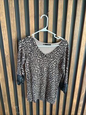 Maurices Leopard Print V-Neck Long Sleeve Top with Black Faux Leather Cuffs